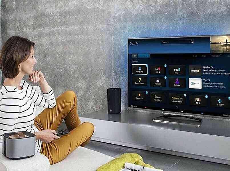 woman watching content on her smart tv